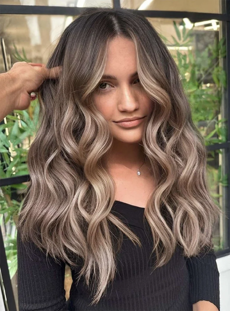 Lang haar met warme balayage en zachte golven